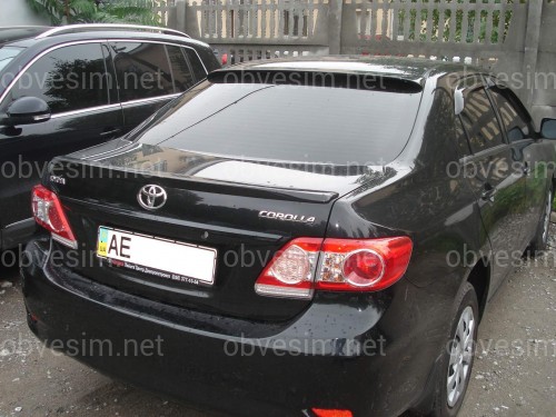 Спойлер лип багажника Toyota Corolla 2007-2012 стеклопластик под покраску