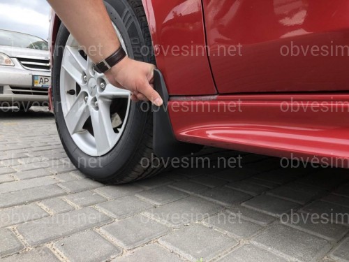 Бризковики передні Mitsubishi Lancer X для моделі з порогами до рейсталінгу комплект 2шт